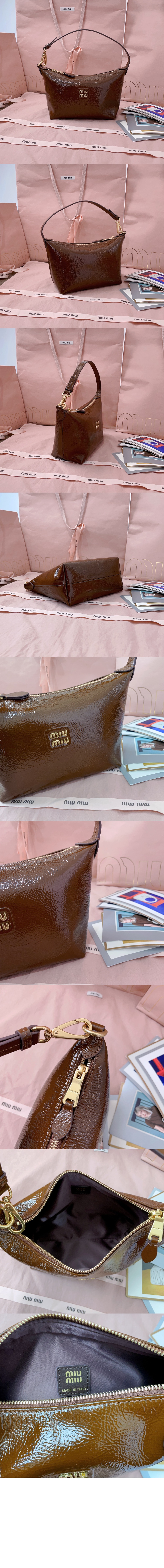 미우미우 나플락 페이턴트 가죽 파우치 5NE841