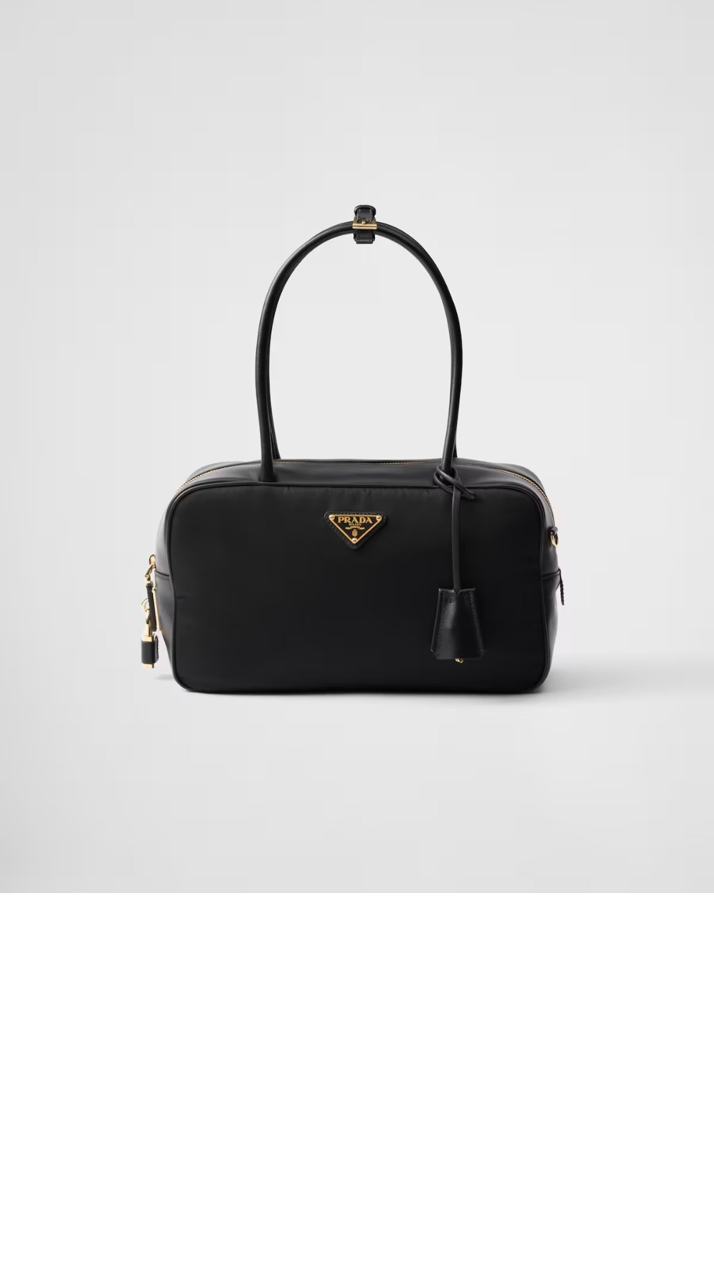 프라다 자물쇠가 있는 미디엄 리나일론 및 가죽 탑 핸들백 1BB132