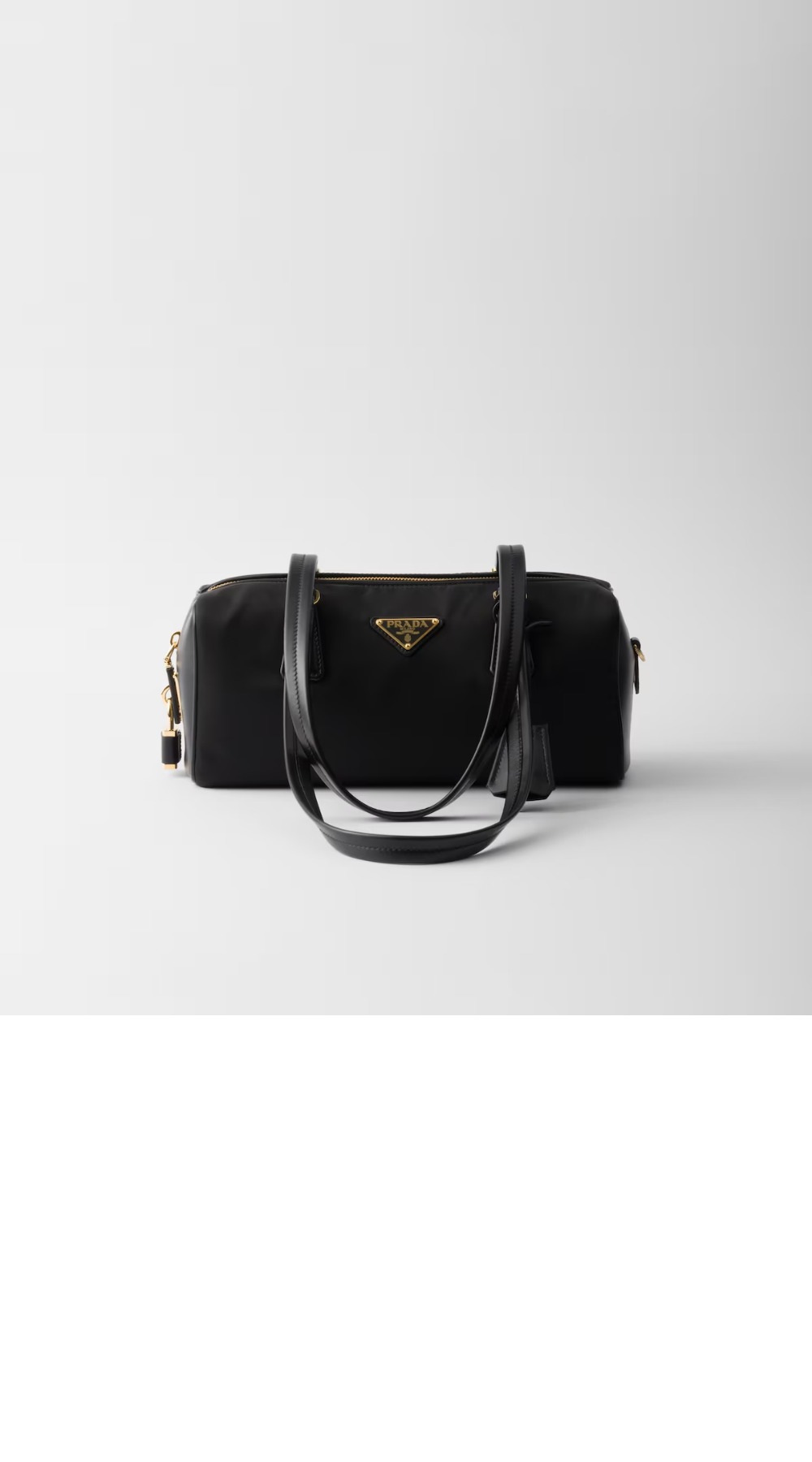 프라다 자물쇠가 있는 미디엄 리나일론 및 가죽 탑 핸들백 1BB127