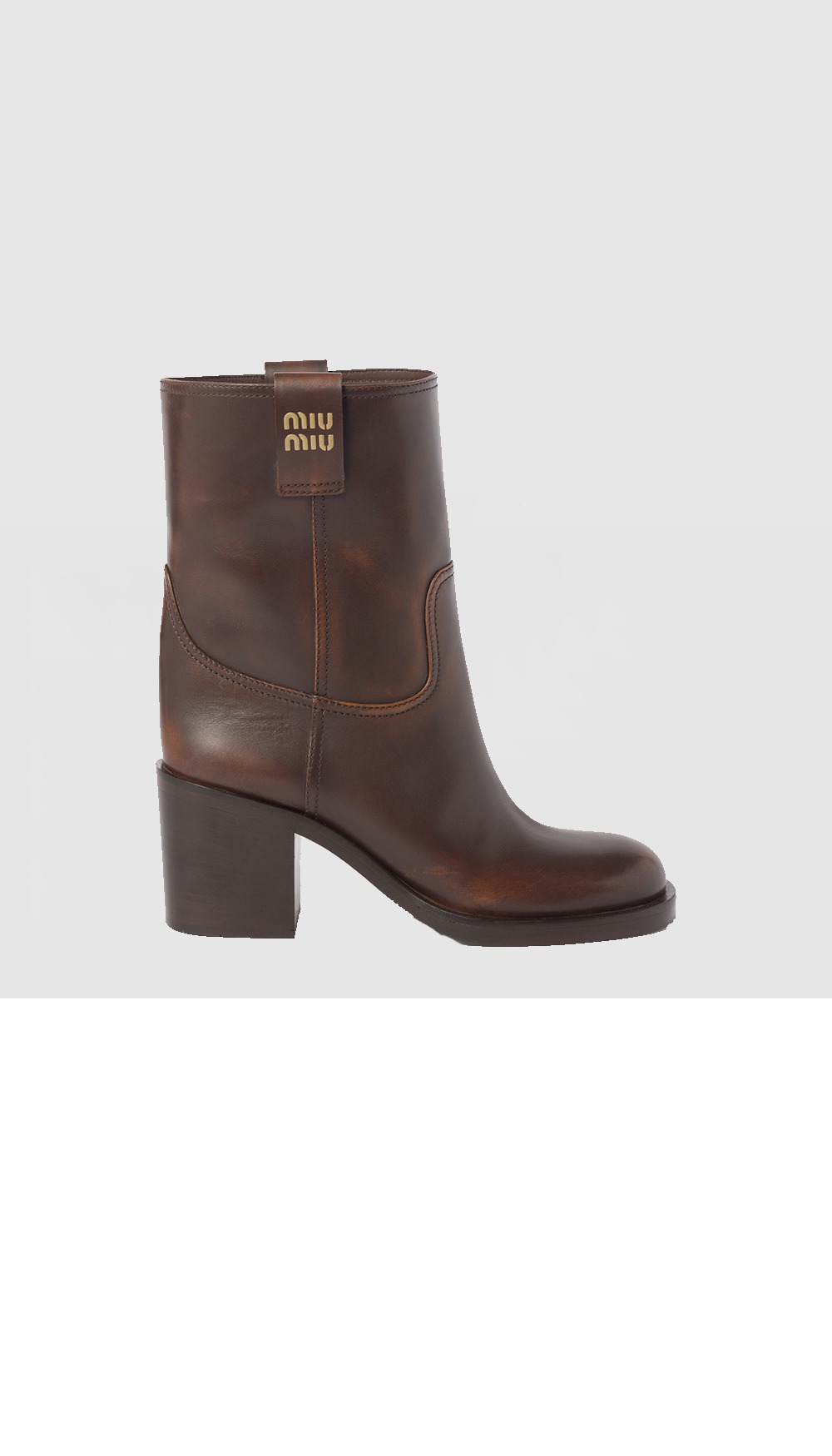 미우미우 퓌메 가죽 부티 5U966D