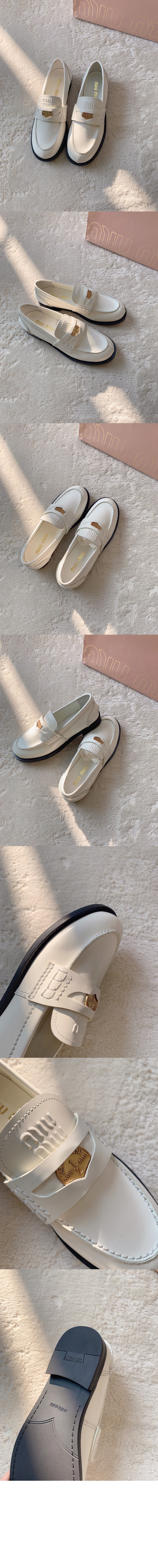 미우미우 빈티지 효과 가죽 페니 로퍼 5D773D