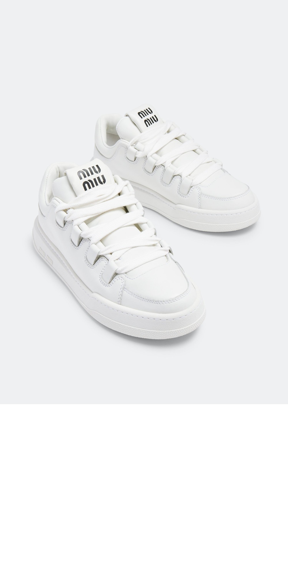 미우미우 블리치드 가죽 스니커즈 5E912D