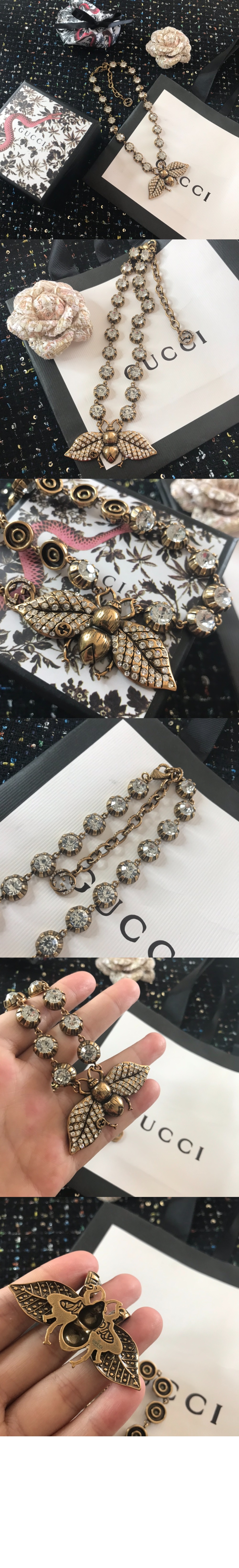 구찌 크리스탈 비 목걸이 629989