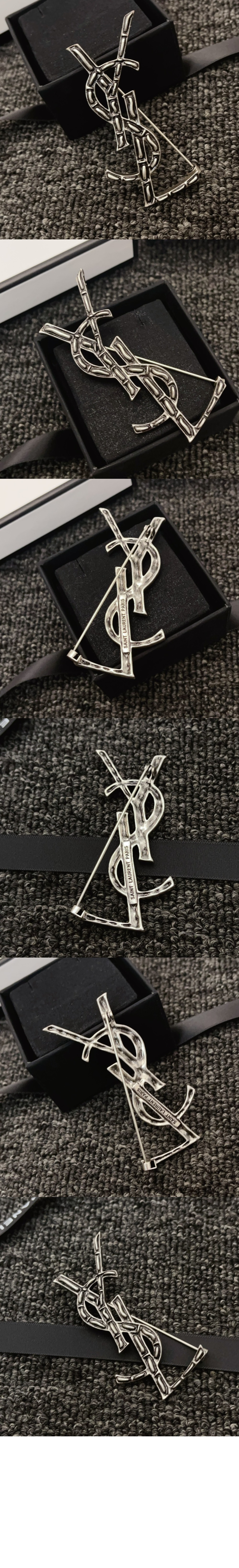 생로랑 메탈 소재의 CASSANDRE 크로커다일 브로치 470371