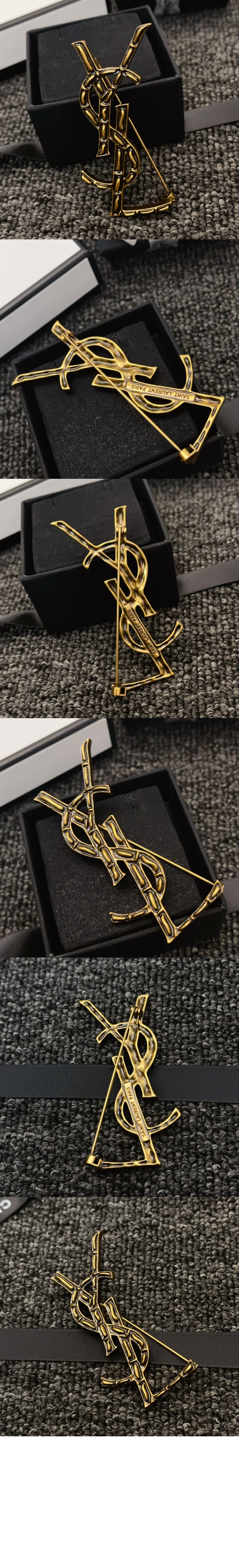 생로랑 메탈 소재의 CASSANDRE 크로커다일 브로치 470371