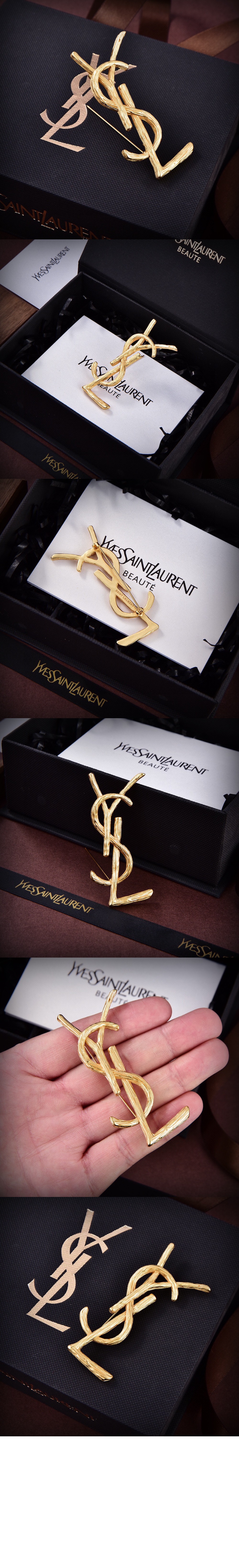 생로랑 메탈 소재의 CASSANDRE 브로치 748486